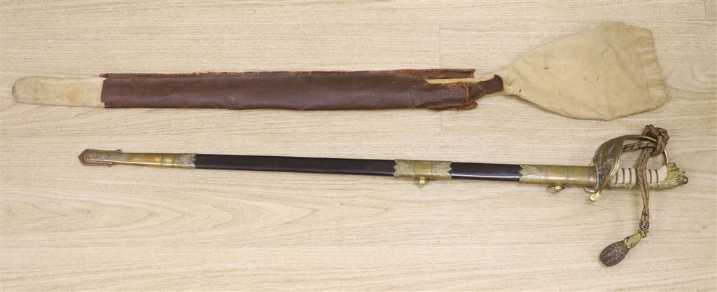 A George V Naval officers sword, by J R Gaunt & Son, Serial No. 16427 together with scabbard and leather case